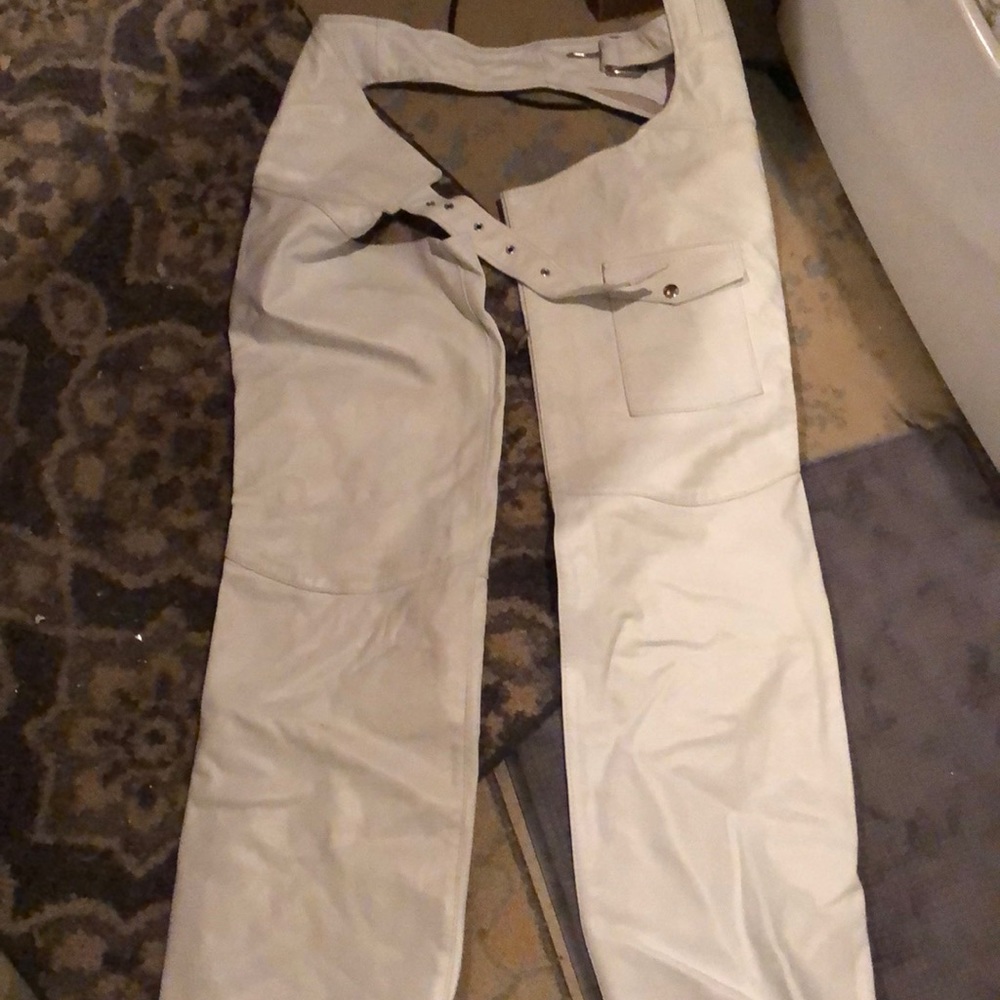 White motorcycle chaps.